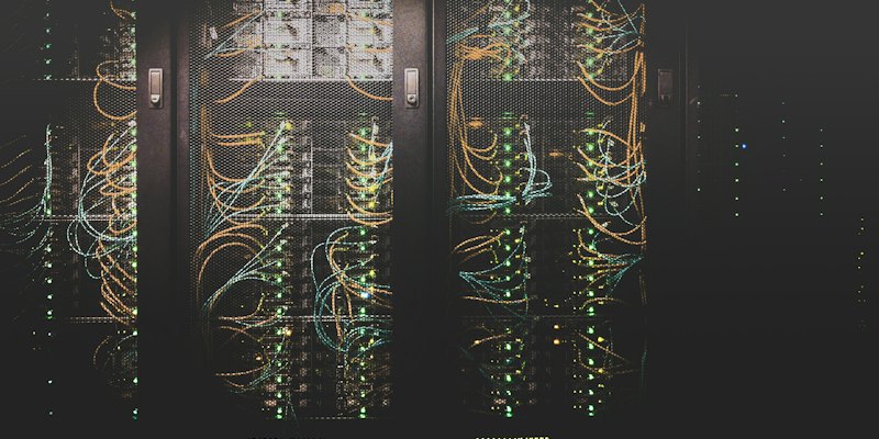 Server racks and cabling representing legacy infrastructure